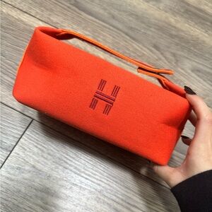 Trendy orange makeup bag